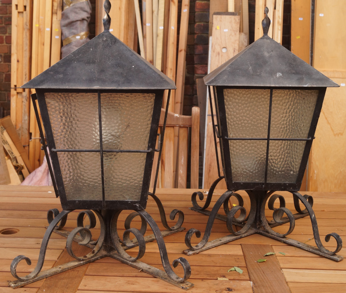 Appraisal: A pair of metal cased garden lantern tops each of