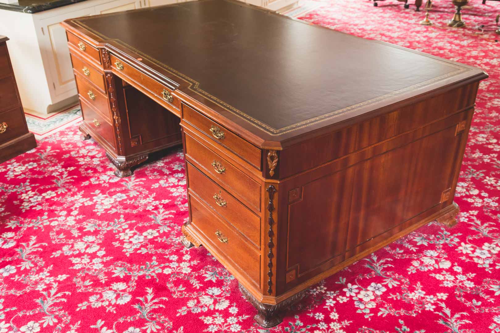 Appraisal: Chippendale style carved mahogany partner's desk with gilt tooled leather