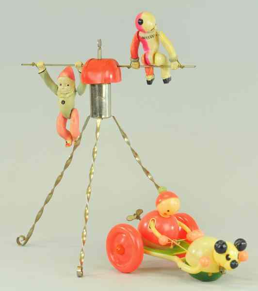 Appraisal: LOT OF TWO CELLULOID TOYS Includes very colorful Mouse cart