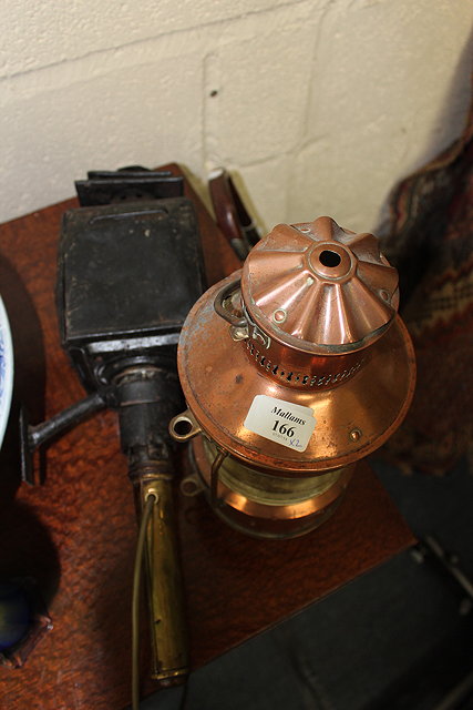 Appraisal: AN OLD COPPER LANTERN together with a carriage lantern