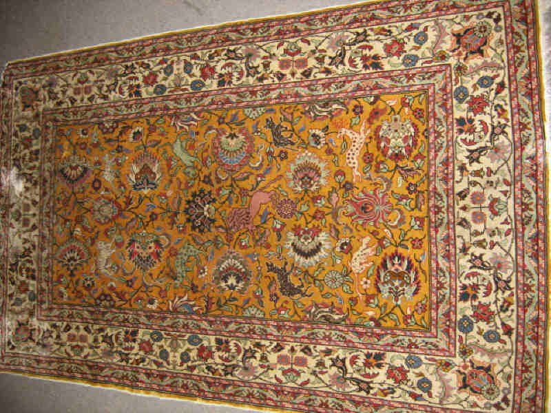 Appraisal: FINE SILK TABRIZ THROW RUG The tan field with allover