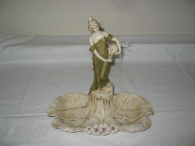 Appraisal: A ROYAL DUX PORCELAIN FIGURAL DISH with female water carrier