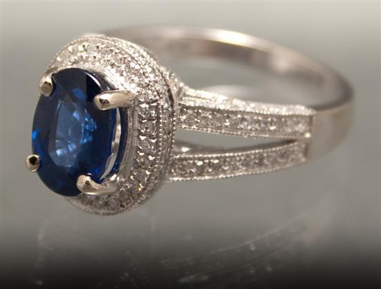 Appraisal: Lady's K white gold diamond and sapphire ring center sapphire