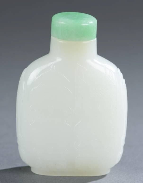 Appraisal: White nephrite jade snuff bottle well carved A Chines exceptionally