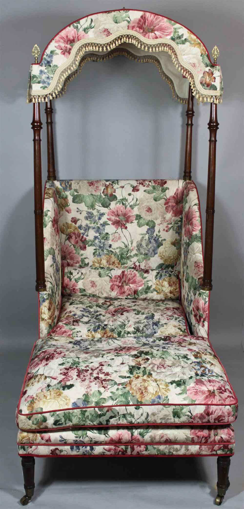 Appraisal: GEORGE III MAHOGANY CANOPY CHAIR AND OTTOMAN early th century