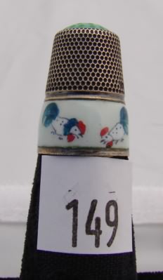 Appraisal: German enamel rooster's stone top thimble