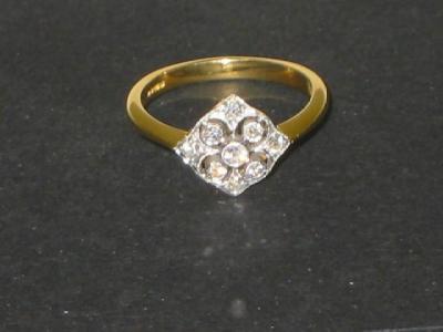 Appraisal: AN ART DECO STYLE DIAMOND RING the pierced squared top