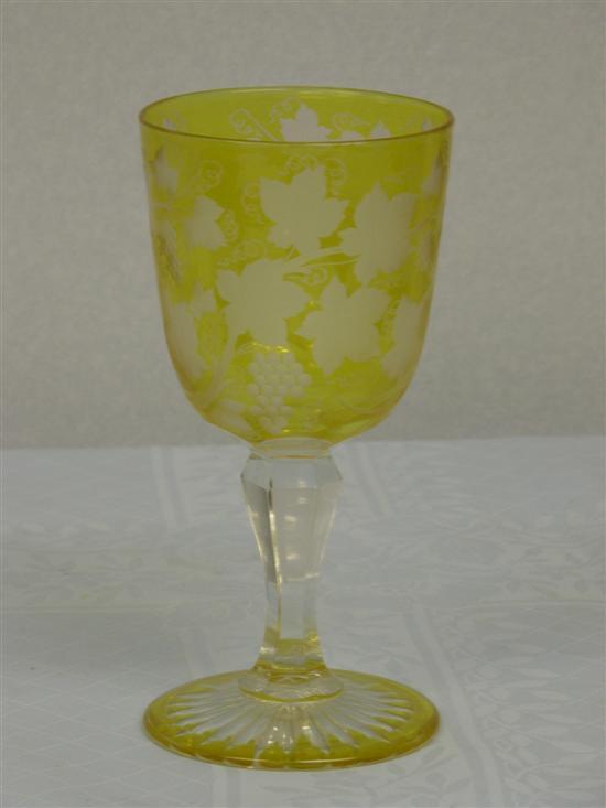 Appraisal: Bohemian yellow cased glass goblet on start cut round base