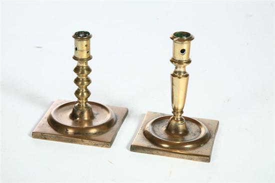 Appraisal: TWO BRASS CANDLESTICKS European th century Similar with square bases