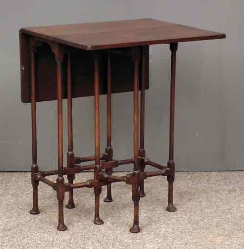 Appraisal: A mahogany rectangular dropleaf ''Spider-Leg'' occasional table with plain top