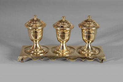 Appraisal: English brass standish three urn-form lidded compartments on footed heavy