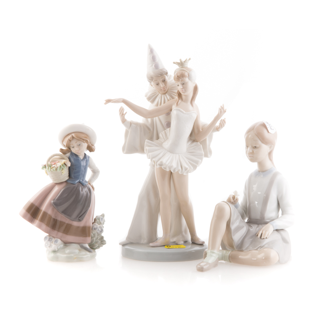 Appraisal: Three Lladro porcelain figures Sweet Scent in H Carnival Couple