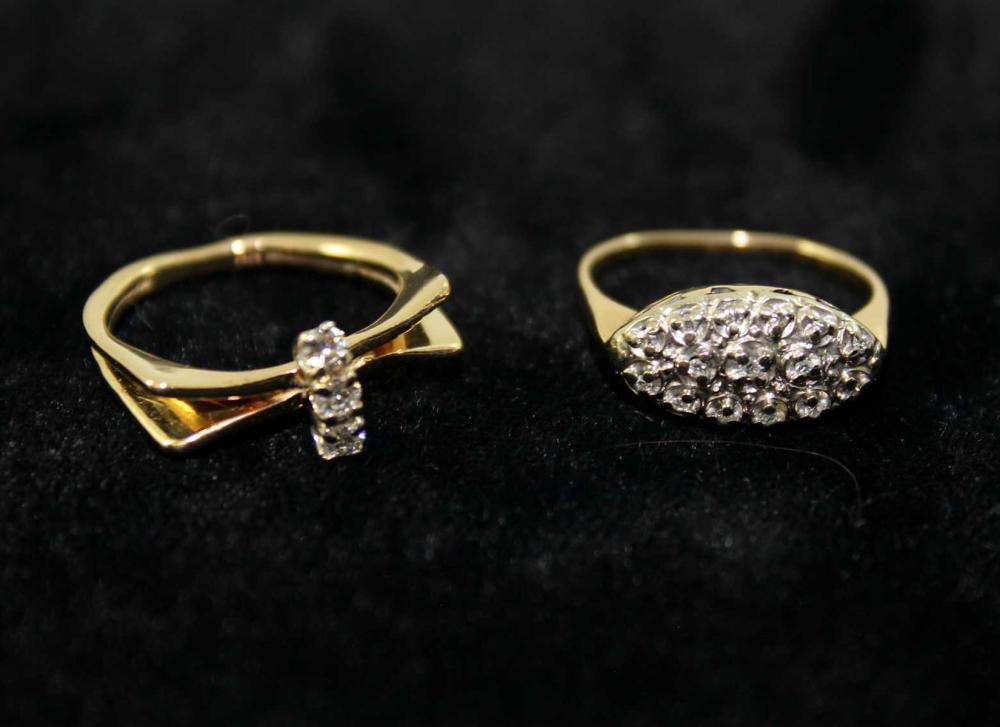 Appraisal: TWO DIAMOND AND FOURTEEN KARAT GOLD RINGS including a k