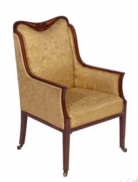 Appraisal: AN EDWARDIAN MAHOGANY ARMCHAIR having an inlaid sunk crest rail