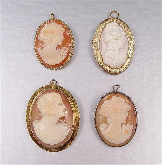 Appraisal: COLLECTION OF CAMEO PINS Two K yellow gold cameos One