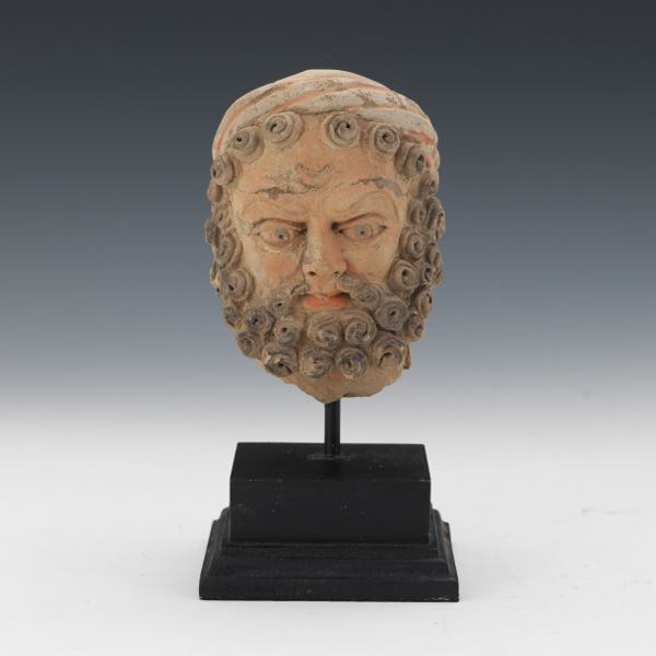 Appraisal: KASHAN TERRACOTTA HEAD OF A BEARDED MAN CA ST- ND