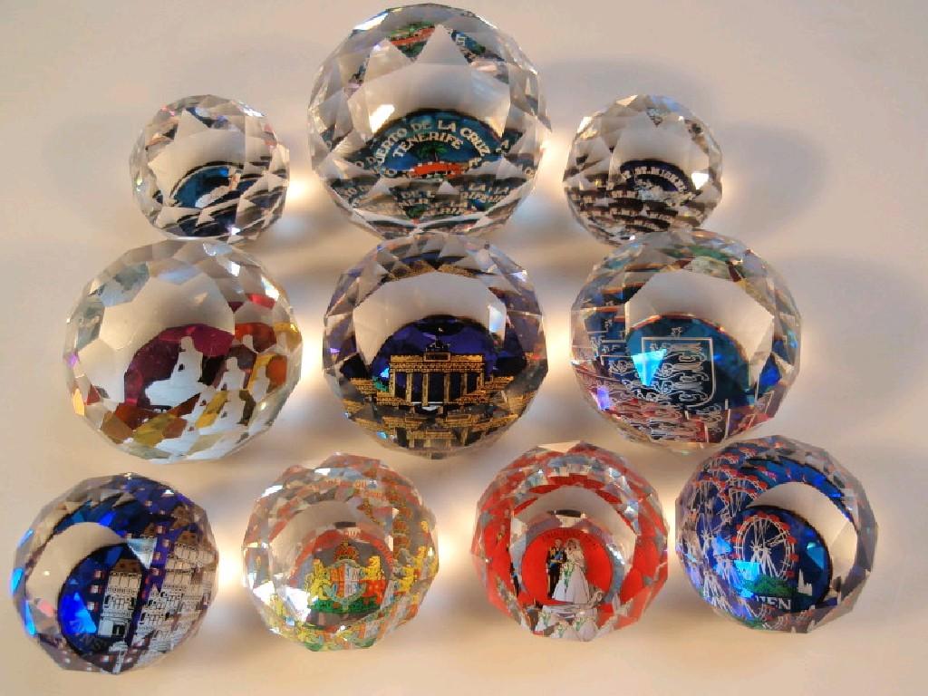 Appraisal: Ten Swarvoski souvenir faceted glass paperweights with pictoral image various