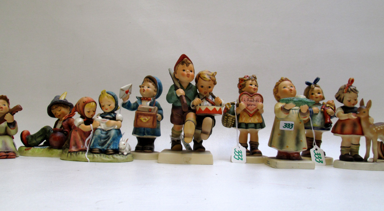 Appraisal: TWENTY ASSORTED HUMMEL PORCELAINS Wall Vase Boy Girl Wall Vase