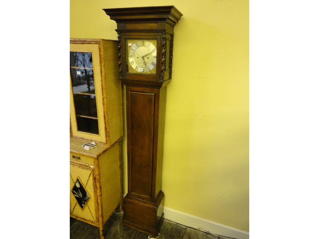 Appraisal: A Georgian oak longcase clock the slender trunk beneath a