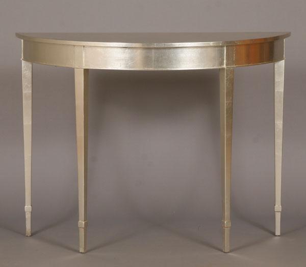 Appraisal: Silver leaf demi-lune entry table H x W x D