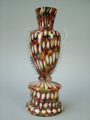 Appraisal: A marbled glass twin handled baluster vase th century on