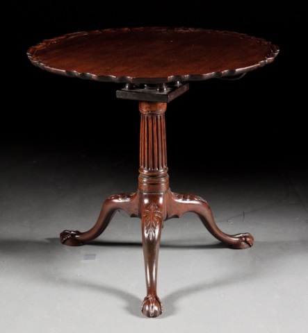 Appraisal: George III mahogany pie-crust tea table fluted column with bird