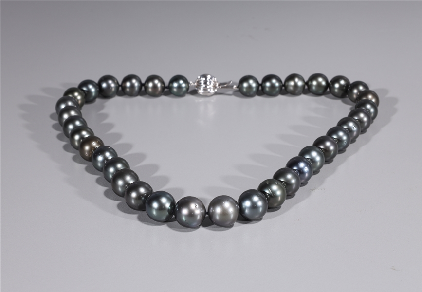 Appraisal: Single strand cultured Tahitian pearl necklace with k white gold