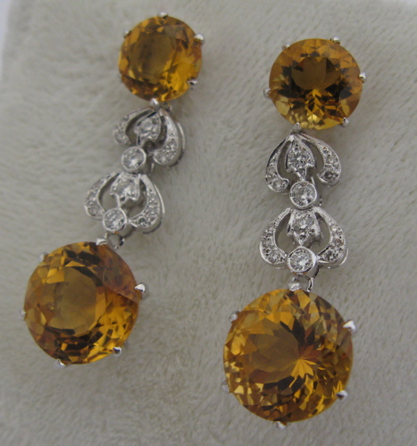 Appraisal: PAIR OF CITRINE DIAMOND AND K GOLD EARRINGS Each white