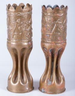 Appraisal: Trench Art Vases Pair Both with foliate motif to top