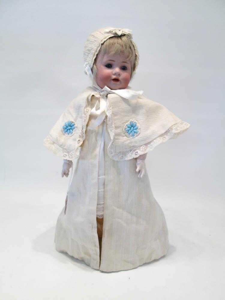 Appraisal: KESTNER BISQUE SOCKET HEAD CHARACTER DOLL with blond wig blue