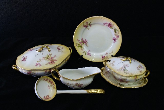 Appraisal: A Royal Doulton Blush dinner service comprising six graduated serving