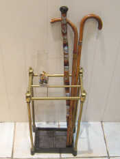 Appraisal: A gold mounted malacca walking stick London together with another