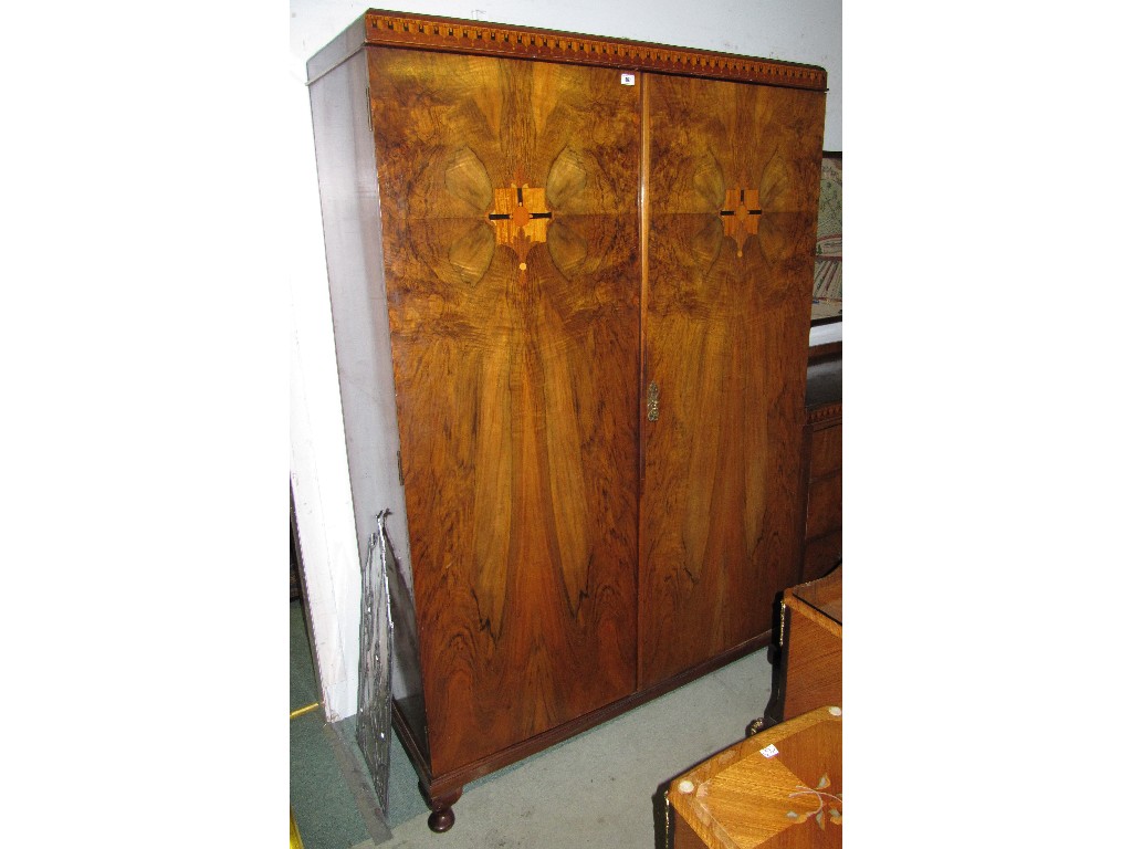 Appraisal: Art Deco walnut and inlaid double wardrobe three drawer chest