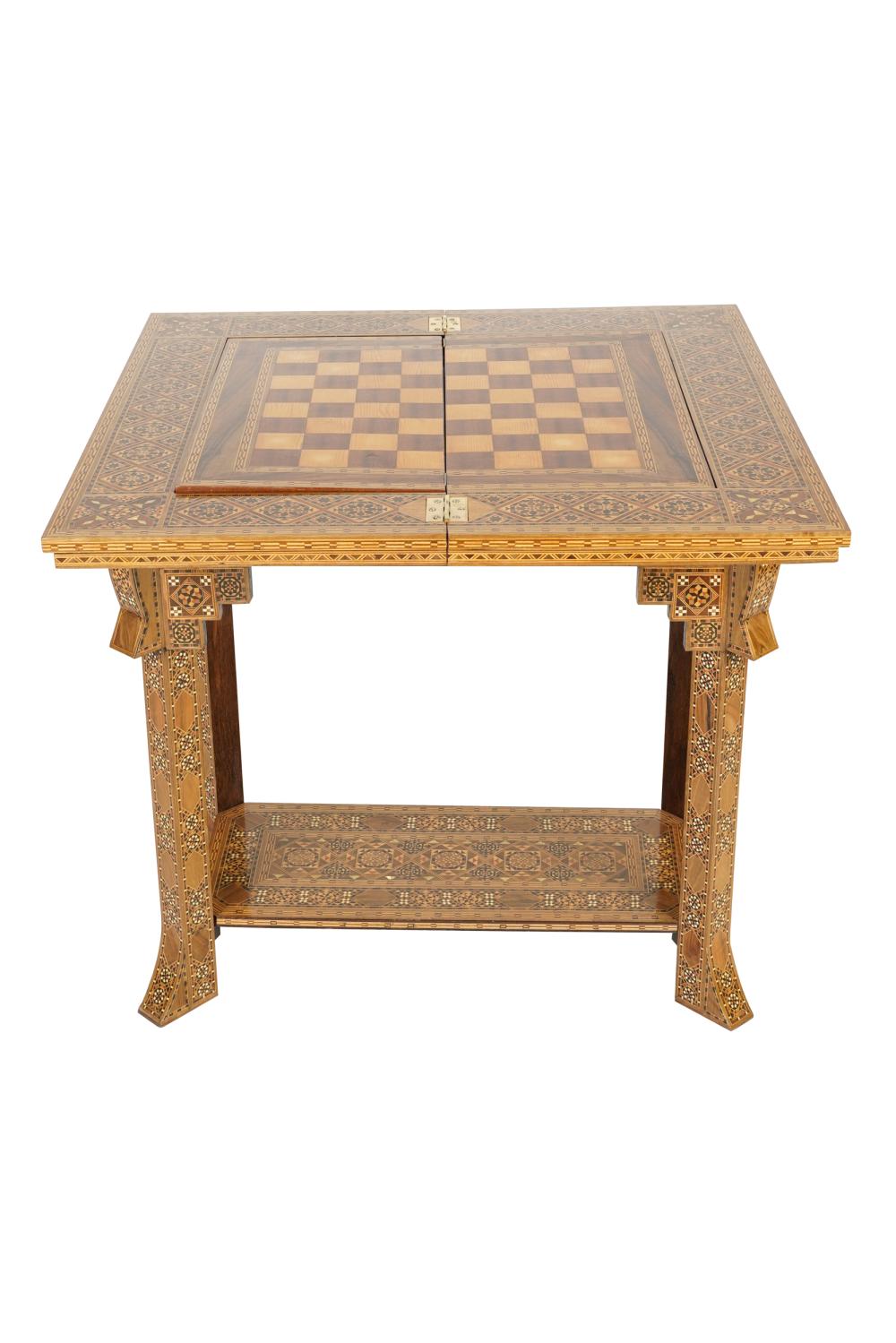 Appraisal: NORTH AFRICAN INLAID GAMES TABLEwith swiveling folding top reversing to