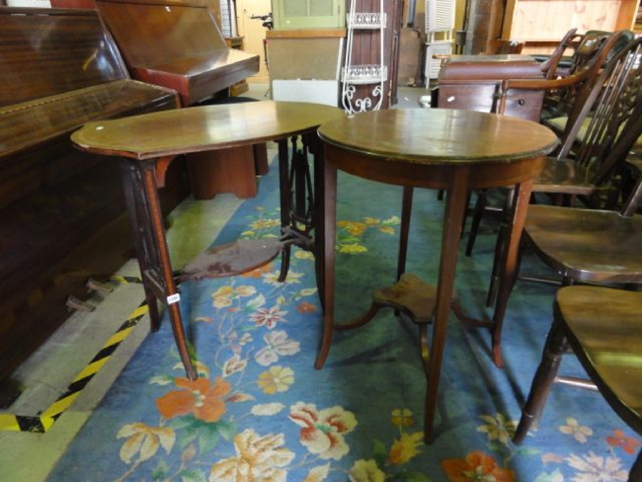 Appraisal: An inlaid Edwardian mahogany -tier occasional table the rectangular top