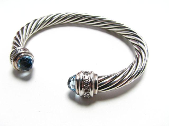 Appraisal: David Yurman sterling silver blue topaz and diamond cuff bangle