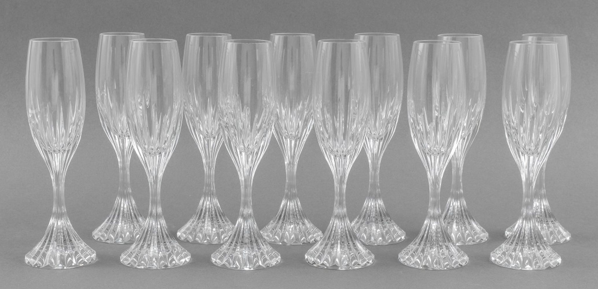 Appraisal: BACCARAT CRYSTAL CHAMPAGNE FLUTES Twelve Baccarat crystal champagne glasses flutes