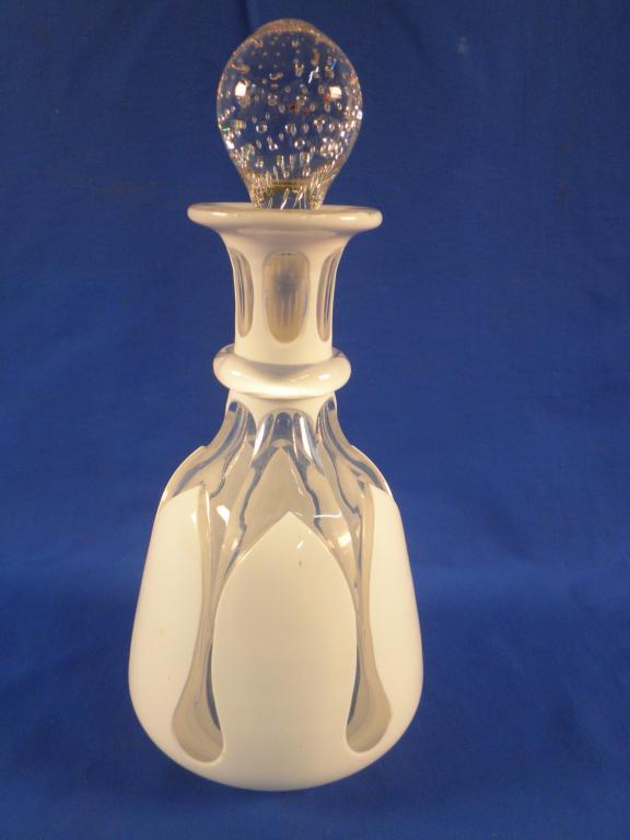 Appraisal: A late thC Bohemian white and overlay glass spirit decanter