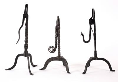 Appraisal: An th Century style wrought iron rush-light holder with scroll