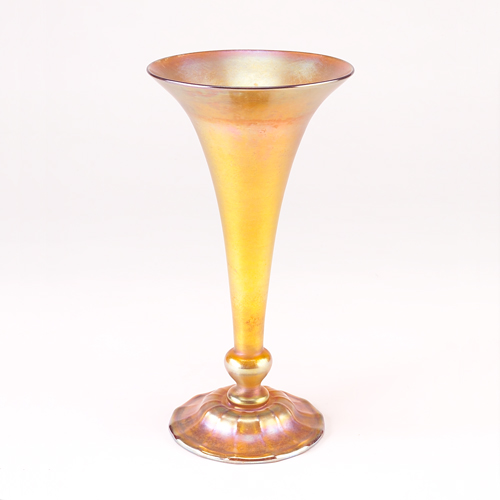 Appraisal: TIFFANY Gold Favrile glass trumpet vase with lower knop and