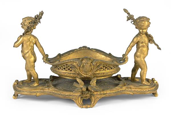 Appraisal: A large good quality Napoleon III gilt bronze table centerpiece