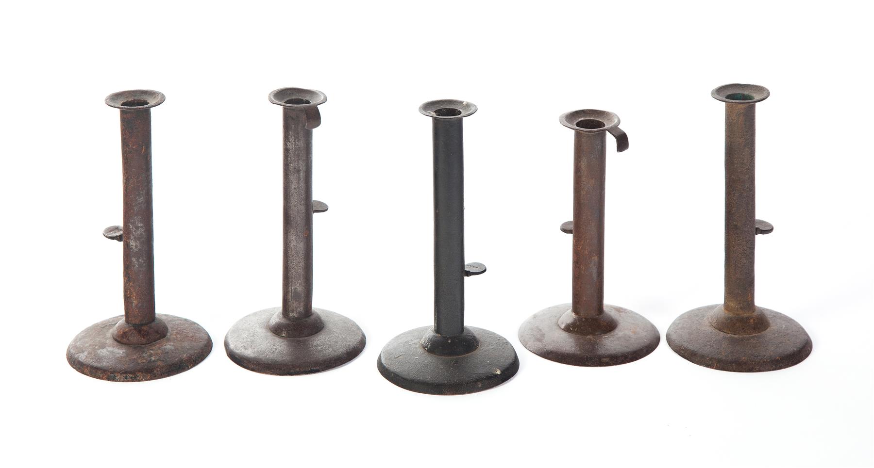 Appraisal: FIVE ENGLISH HOGSCRAPER CANDLESTICKS First half- th century All with