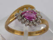 Appraisal: A carat gold ruby and diamond ring ruby approx x