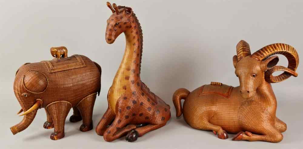 Appraisal: THREE CHINESE WOVEN BASKETRY ANIMALS Including an elephant giraffe and