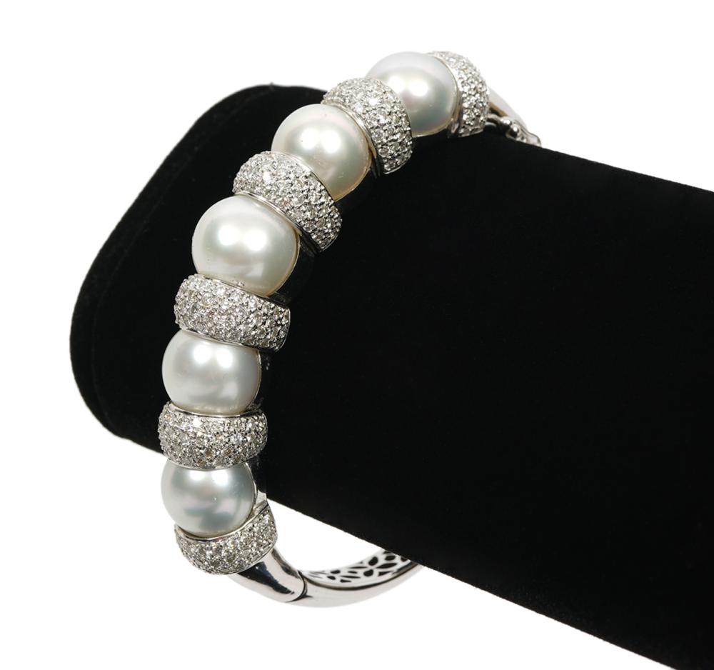 Appraisal: Contemporary diamond white pearl K white gold hinged bangle bracelet