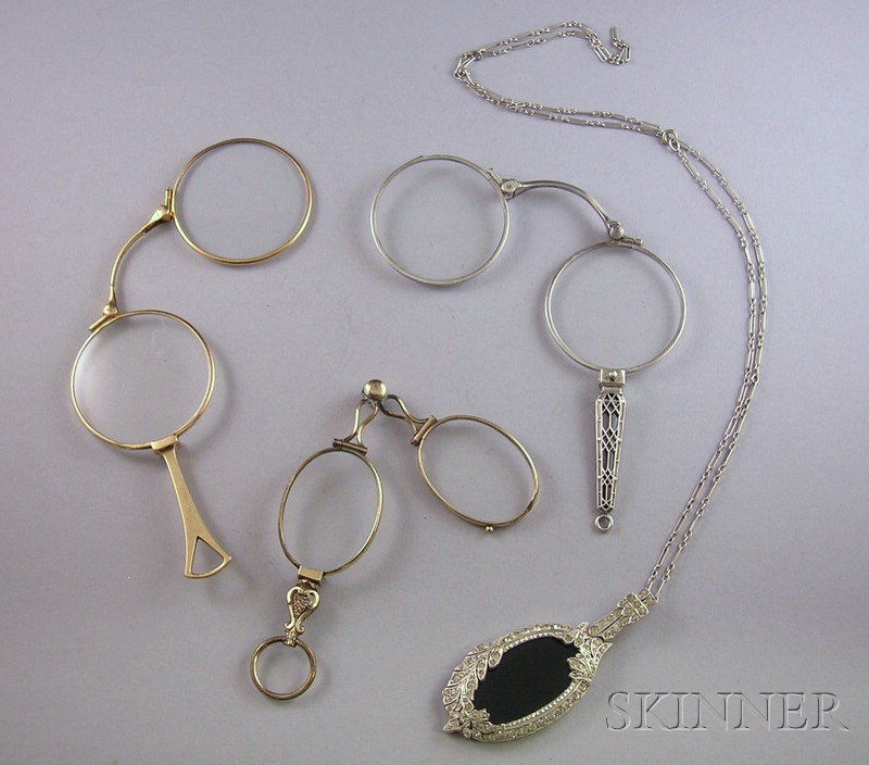 Appraisal: Three Lorgnettes one kt yellow gold one sterling silver and