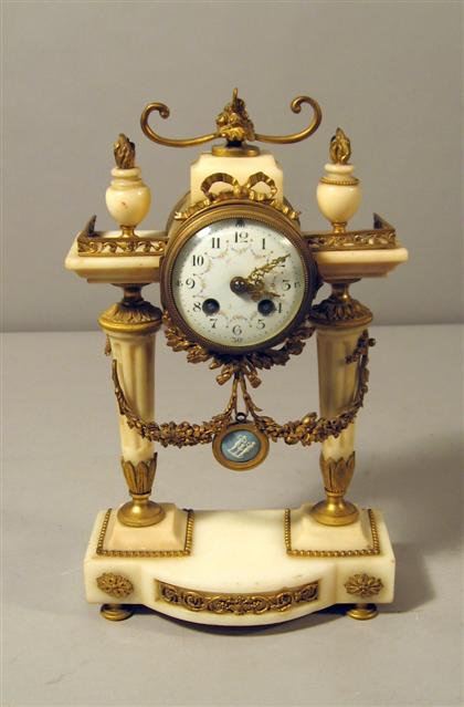 Appraisal: French gilt bronze mounted marble mantel clock late th century