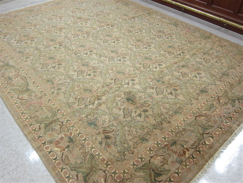 Appraisal: HAND KNOTTED ORIENTAL CARPET Indo-Persian overall foliate design on light