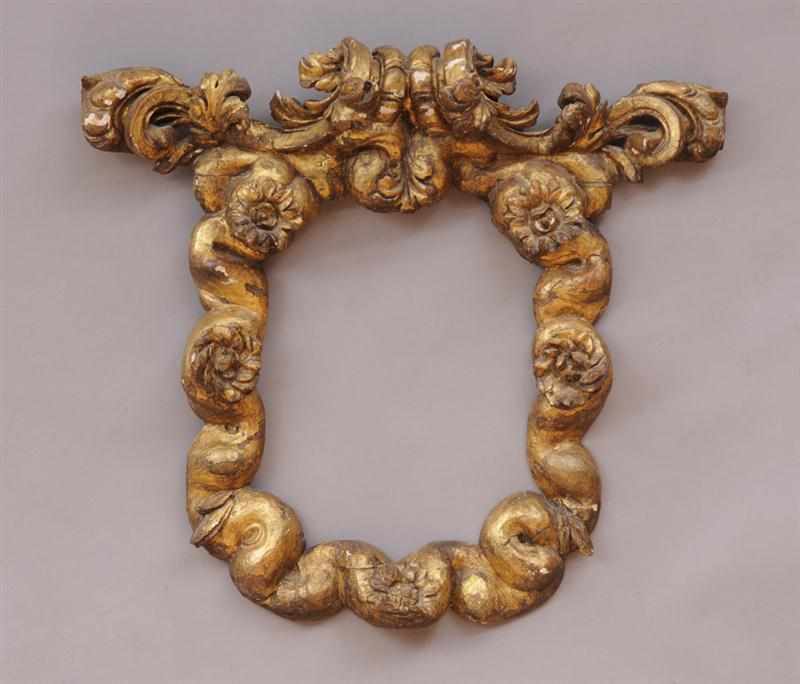 Appraisal: ITALIAN BAROQUE CARVED GILTWOOD MIRROR FRAME The meander cloud-form border