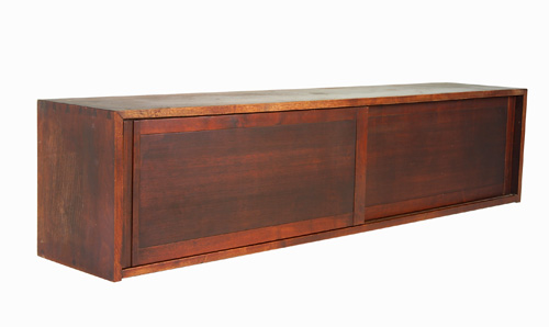 Appraisal: GEORGE NAKASHIMA Walnut wall-hanging cabinet with pinned and dovetailed case